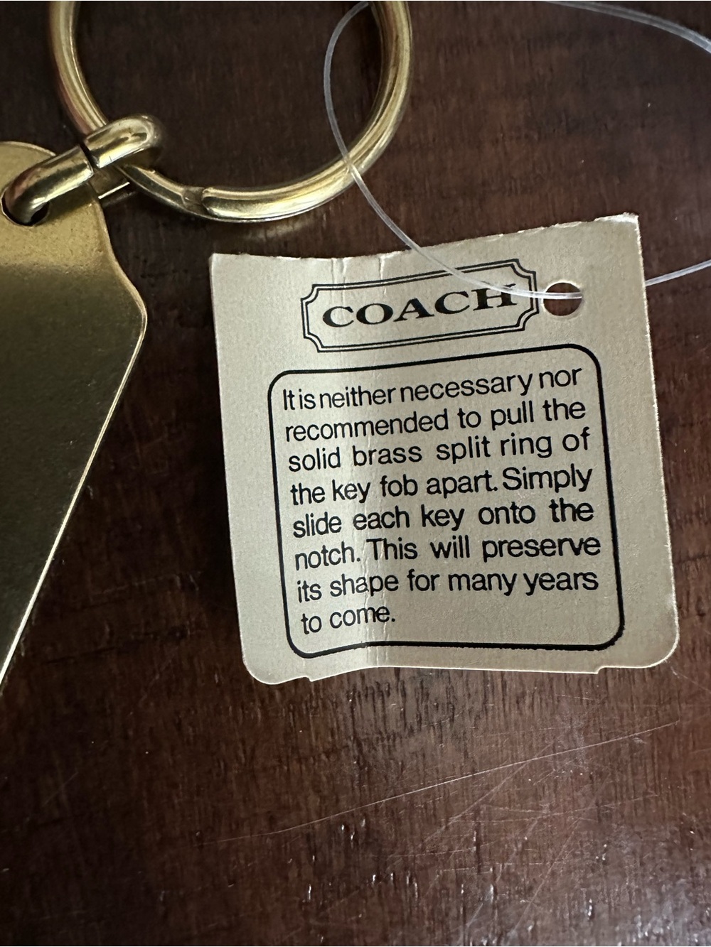 Coach Vintage Brass Hangtag Keychain - Picture 5 of 7